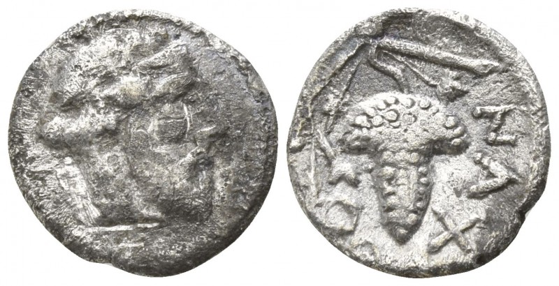 Sicily. Naxos 461 BC.
Litra AR

12mm., 0,56g.

Bearded and ivy-wreathed hea...