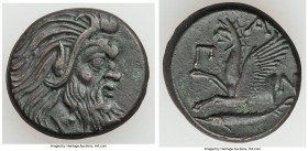 CIMMERIAN BOSPORUS. Panticapaeum. 4th century BC. AE (22mm, 7.58 gm, 12h). XF. Head of bearded Pan right / Π-A-N, forepart of griffin left, sturgeon l...