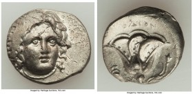 CARIAN ISLANDS. Rhodes. Ca. 305-275 BC. AR didrachm (21mm, 6.36 gm, 1h). XF, Fine Style, flan flaw. Head of Helios facing, turned slightly right, hair...