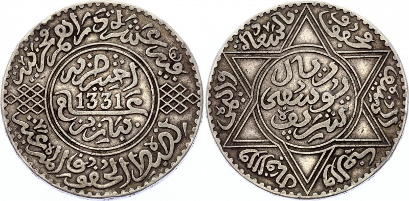 Morocco 1 Rial 1913 AH 1331
Y# 33; Silver; Yusuf; XF