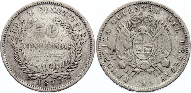 Uruguay 50 Centesimos 1877 A
KM# 16; Silver; Obv: Flagged arms within sprigs, s...