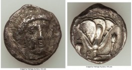 CARIAN ISLANDS. Rhodes. Ca. 340-305 BC. AR didrachm (20mm, 5.96 gm, 12h). VF, porosity, scratches. Ca. 340-320 BC. Head of Helios facing, turned sligh...