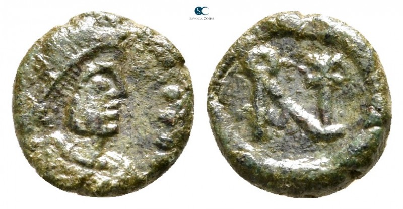 Anastasius I AD 491-518. Constantinople
Nummus Æ

10 mm., 0,80 g.



very...