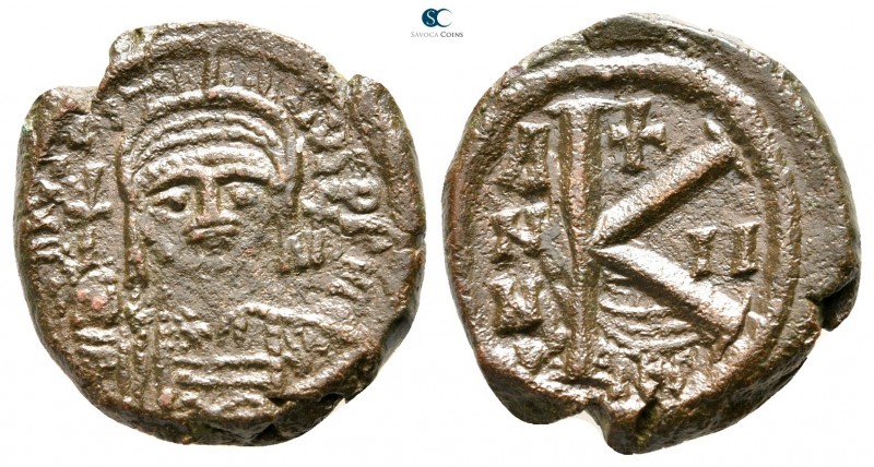 Justin II AD 565-578. Thessalonica
Half follis Æ

21 mm., 6,66 g.



near...