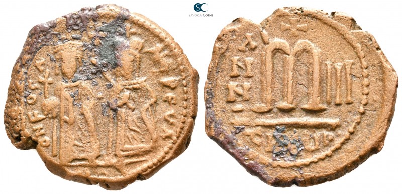 Phocas, with Leontia AD 602-610. Theoupolis (Antioch)
Follis Æ

28 mm., 9,09 ...