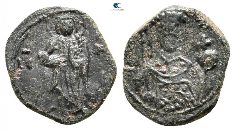 John II Comnenus AD 1118-1143. Thessalonica
Half tetarteron A

14 mm., 1,34 g...