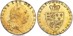 George III gold Guinea 1794 MS63 PCGS, KM609, S-3729. "Spade" type. A lovely piece, highly lustrous surfaces shining with tinges of light champagne co...