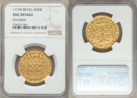 João V gold 4000 Reis 1719-B UNC Details (Cleaned) NGC, Bahia mint, KM106, Fr-30, LMB-65. An extremely well-made example, its strike definitive enough...