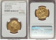 George IV gold 2 Pounds 1823 AU Details (Obverse Graffiti) NGC, KM690, S-3798. A popular one year type, incised with the number '125' very faintly ben...
