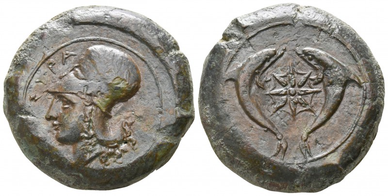 Sicily. Syracuse 405-367 BC.
Drachm AE

30mm., 32,60g.

Head of Athena left...
