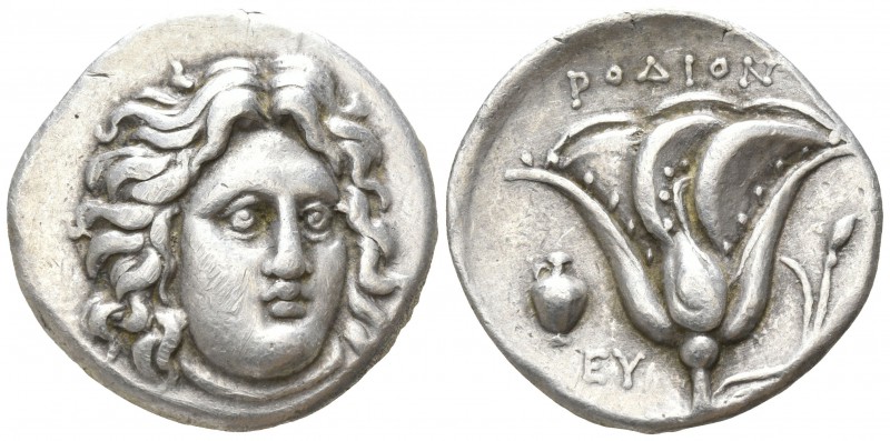Caria. Rhodos 305-274 BC.
Didrachm AR

20mm., 6,64g.

Head of Helios facing...
