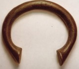 West Africa, "Manilla" (slave) bracelet money, copper, abt 4-1/2 ozs, 82 mm wide, 18th-19th cent, smooth dark brown patina. Nice example.