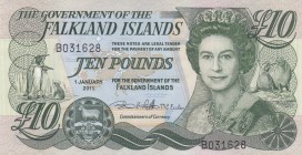 Falkland Islands, 10 Pounds, 2011, UNC, p18 
Queen Elizabeth II potrait. 
Serial Number: B031628
Estimate: 30-60 USD