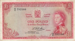 Rhodesia, 1 Pound, 1964, VF (-), p25a 
Portrait of Queen Elizabeth II
Serial Number: G/8 792166
Estimate: 75-150 USD