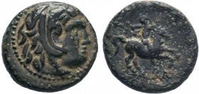Kings of Macedon. Uncertain mint in Macedon. Philip III Arrhidaeus 323-317 BC. AE Bronze.Head of Herakles right, wearing lion skin / ΦΙ/ ΒΑ, horseman ...