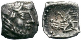 Lycaonia, Laranda. AR Obol , c. 324/3 BC.Obv. Head of Herakles to right.Rev. Forepart of a wolf right; Λ above.SNG Levante 227; SNG von Aulock 8656; K...