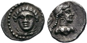 CILICIA, Uncertain mint. Circa 4th Century BC. AR Obol . Female head facing slightly left, hair in curls, drapery around neck / Draped bust of Aphrodi...