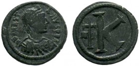 BYZANTINE.Justinian I, AE Half-follis. Constantinople. DN IVSTINIANVS PP AVG, pearl diademed, draped, cuirassed bust right / Large K, long cross to le...