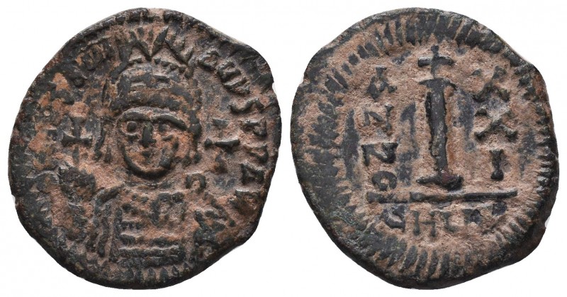 Justinianus I (527-565 AD). AE halfFollis 
Condition: Very Fine

Weight: 5 gr
Di...