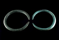 Bronze Age, Pair of Bronze Penannular Bracelets, c. 2nd Millennium BC (11-11.5cm). Heavy armlets, green patina.