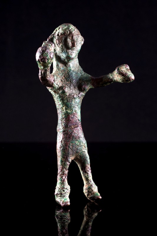 Oriental Greek, Bronze cast figure. c. 6th century BC (8cm). Naked female figure...