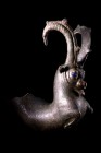 Achaemenid Bronze Ibex Rhyton, c. 5th-4th century BC (13.5cm). Drinking horn ending with ibex forepart with blue glass eyes. Nice green patina, broken...