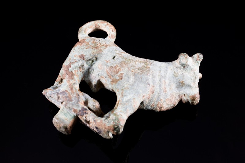 Egypt, Bronze Apis Bull, c. 5th-4th century BC (4.1cm). Green patina, stand miss...