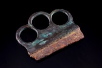 Celtic Bronze Attachment formed of three rings, c. 2nd-1st century AD (6.8cm). Part of a larger artefact. Green patina.
