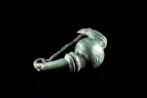 Greek Bronze Bow Fibula, c. 8th-7th century BC (4.5cm). Knobbed brooch with spring and pin. Intact, nice green patina.