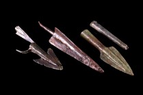 Greek, Lot of 4 bronze arrow-heads. 4th-2nd century BC. Different provenances and lenghts from 35 to 76 mm. Three of them intact and only one broken. ...