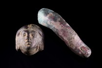 Lot of 2 Roman Bronzes. c. 1st-3rd century AD. The first is a finger, probably framment of a Roman life size statue. (8.5cm) while the second is an ap...