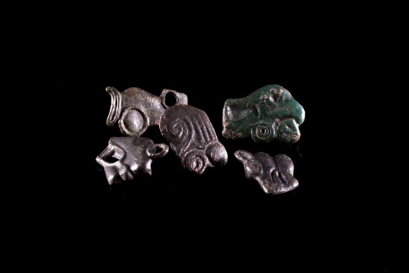 Lot of 5 Roman Bronze Appliques. c. 1st-3rd century AD. Green patina and mostly ...