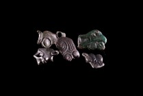 Lot of 5 Roman Bronze Appliques. c. 1st-3rd century AD. Green patina and mostly intact.