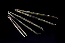 Lot of 3 Roman Bronze Tweezers, c. 1st-2nd century AD (7-11cm). One with suspension loop and decorated with dots and lines. Intact.