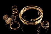 Lot of 6 Roman debassed gold spiral jewellery, one bracelet and five finger rings or for hair. The surfaces are smooth and partially decorated with gr...
