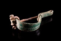 Roman Bronze P-Shaped Fibula, c. 2nd century AD (8.5cm). Bow decorated with X-pattern design. Green patina.