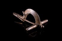 Roman Silver Crossbow Fibula with one knob on the top and needle on the back. c. 2nd-3rd century AD. (3.2cm - 5cm). Lightly patina, insignificant crac...