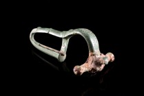 Roman Bronze Crossbow Fibula, 3rd-4th century AD (6.2cm). Brooch with three knobs, decorated with pellet and line patterns. Green patina, pin missing.