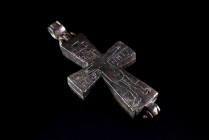 Byzantine Bronze Enkolpion (Reliquary Cross), c. 10th-12th century AD (10.2cm). Engraved with Christ upon the cross; IC XC - NHKA below arms. R/ Theot...