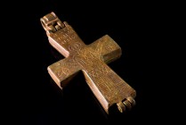 Byzantine Bronze Enkolpion (Reliquary Cross), c. 10th-12th century AD (8.2cm). Engraved St. John facing, orans; O AΓH/OC HOA/NHC above. R/ Central cro...