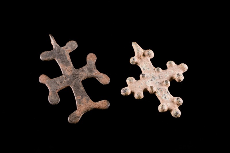 Two Byzantine Bronze Cross Pendants, c. 9th-12th century AD (4,2-4,8cm). Green p...