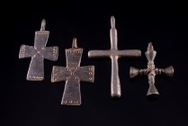 Lot of 4 Byzantine Cross Pendants. c. 10th-12tn century AD. Only one with missing loop, others intact.