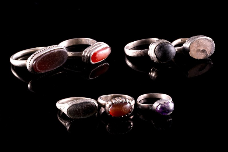 Lot of 7 Medieval Silver Finger Rings with glass paste. c. 14th-15th century. Mo...