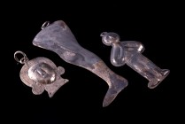 Lot of 3 Medieval White Metal Pendants. The first is a human leg, the second is a face and the third is a male figure facing, praying. In good conditi...