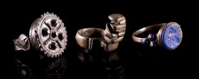 Lot of 3 Bronze Finger Rings. One is a Roman key ring (II-IV century), the others are modern: one with a gemstone showing a male figure r. and the las...