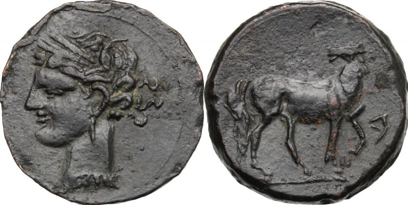 Punic Sardinia. AE 22 mm. c. 230-220 BC. D/ Head of Kore left, wearing wreath of...