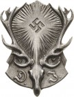 Drittes Reich
 Versilbertes Weißmetallabzeichen o.J. Jagdschutzabzeichen des Reichsbundes Deutscher Jägerschaft. 43,2 x 33,2 mm, 13,49 g. Rs. Nadel H...