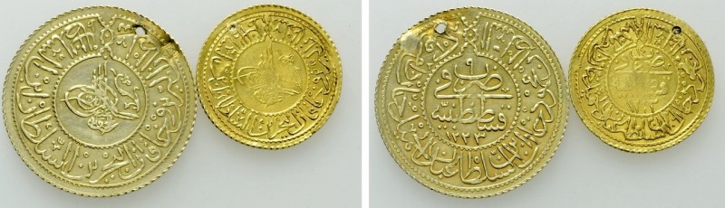 2 Ottoman Gold Coins. 

Obv: .
Rev: .

. 

Condition: See picture.

Wei...