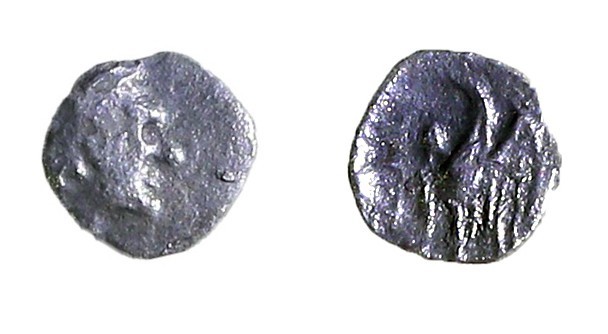 YEHUD UNDER PTOLEMAIC RULE 3rd century BCE. Silver quarter obol, 0.12 gr. Obvers...