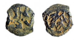 HEROD THE GREAT, 40 – 4 BCE Bronze, 10.2 mm. Obverse: Tripod. Reverse: Bunch of grapes with vine branch. Very Fine and very rare. Meshorer TJC 58; Hen...